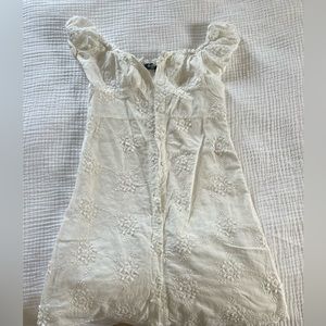 White mini dress with detailing